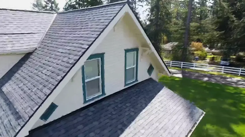 Home with a gabled shingle roof